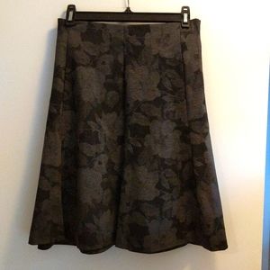 Black skirt with subtle gray floral pattern